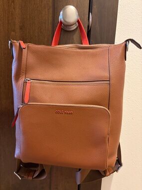 Cole Haan Tan Leather Backpack with Coral Trim- additional guitar strap